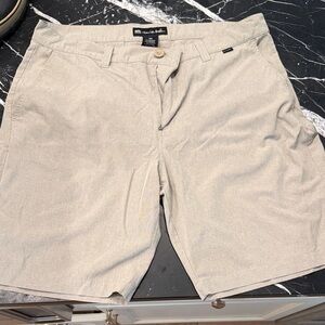 Travis Mathew Men’s Light Beige Flat Front Performance Shorts